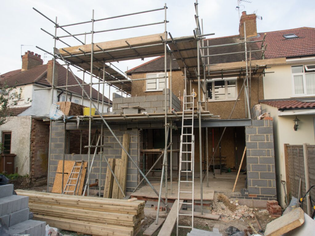 GFD Homes building regulations: Extension being built on a home with scaffolding. 