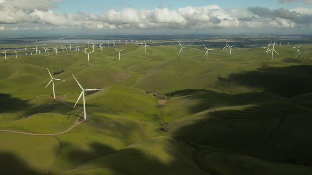 GFD Homes building regulations: A range of wind turbines on a large area of green space. 