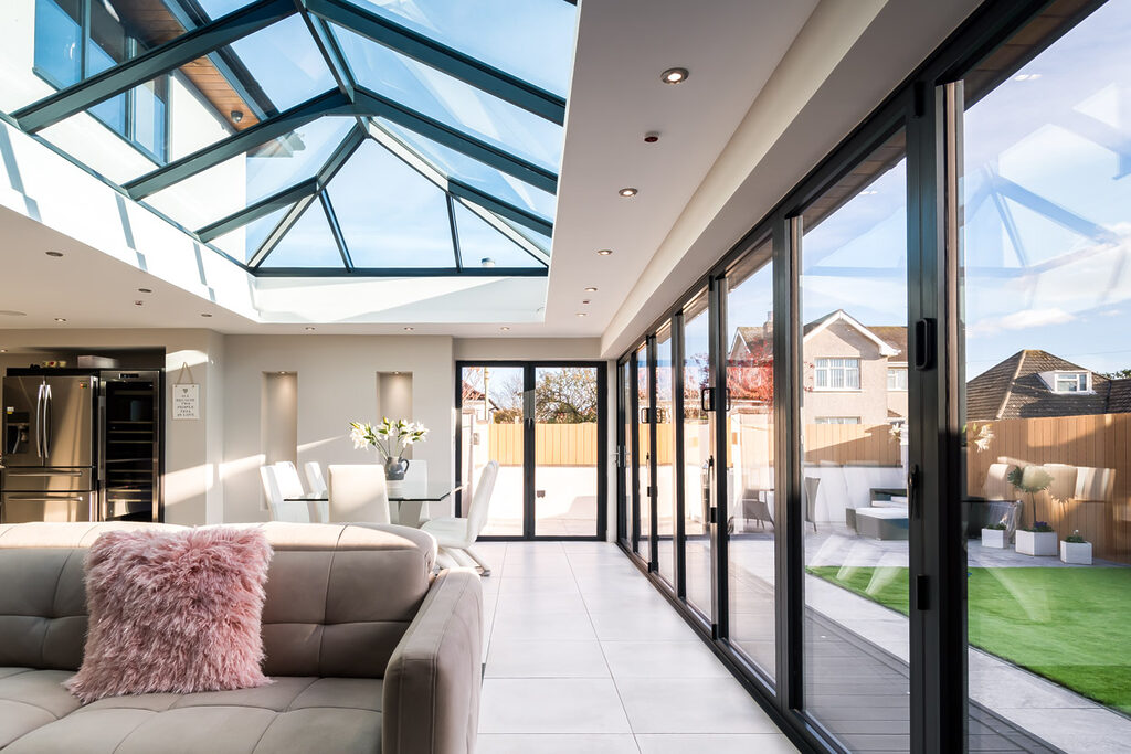 GFD Homes Large roof lantern installed above a living room area to allow more natural light to fall into the room and brighten it up. 