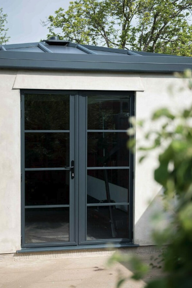 GFD Homes French patio doors installed as entrance doors for an outbuilding. 