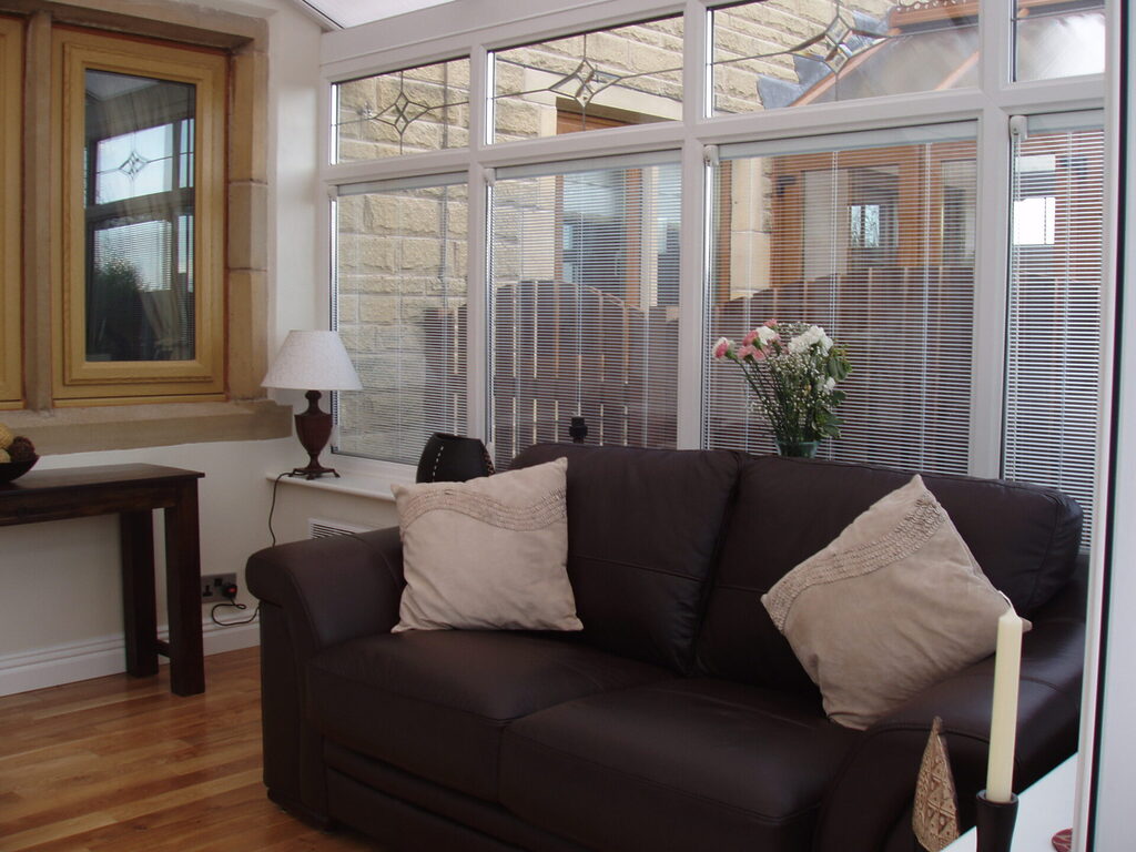 GFD Homes Integral blinds installed in a living room area.