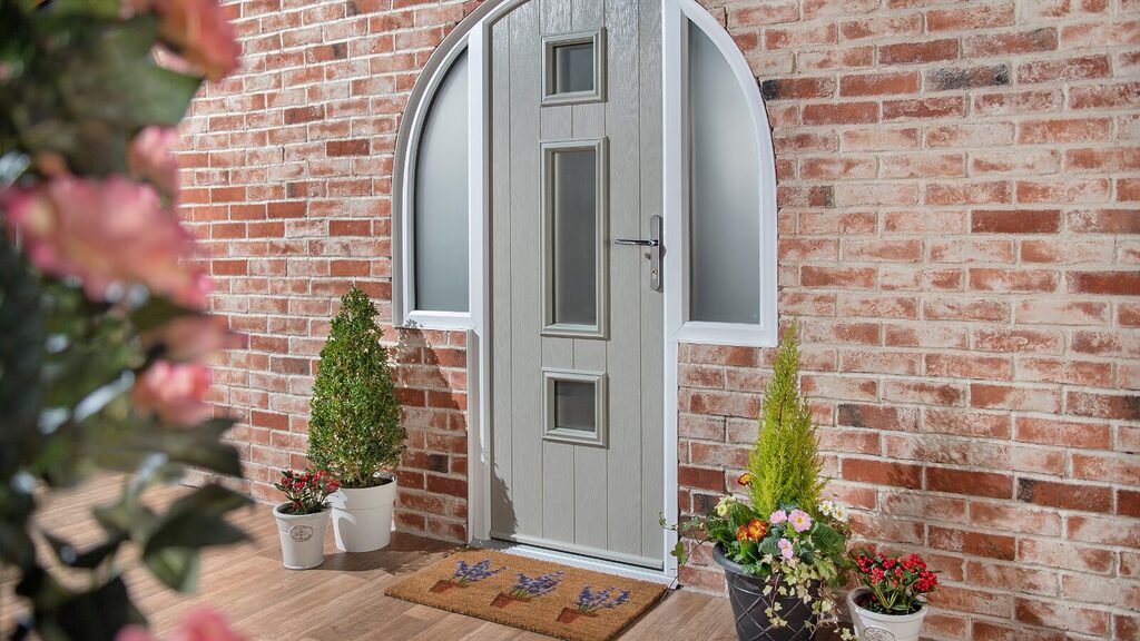 GFD Homes Exterior door: New Solidor exterior door colour, Pebble Grey displayed as part of a front entrance.