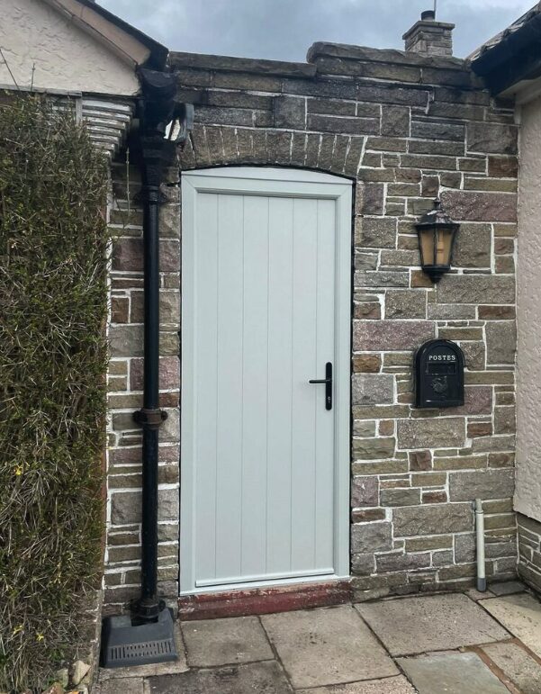 GFD Homes Front door colours: Comp Door Norfolk in Agate Grey. 