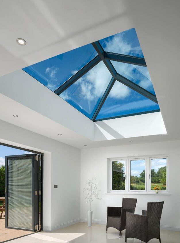 GFD Homes Large roof lantern installed above room with bifold patio doors.  