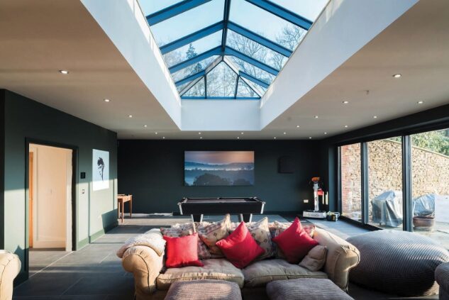 GFD Homes Large roof lantern installed above an open plan living room. 