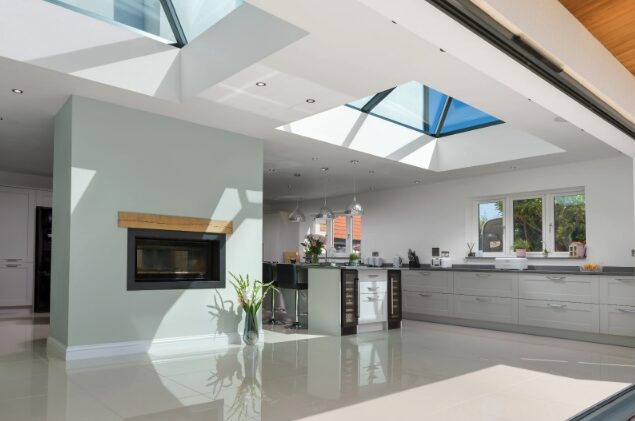 GFD Homes Large open plan kitchen with 2 Korniche roof lanterns fitted.