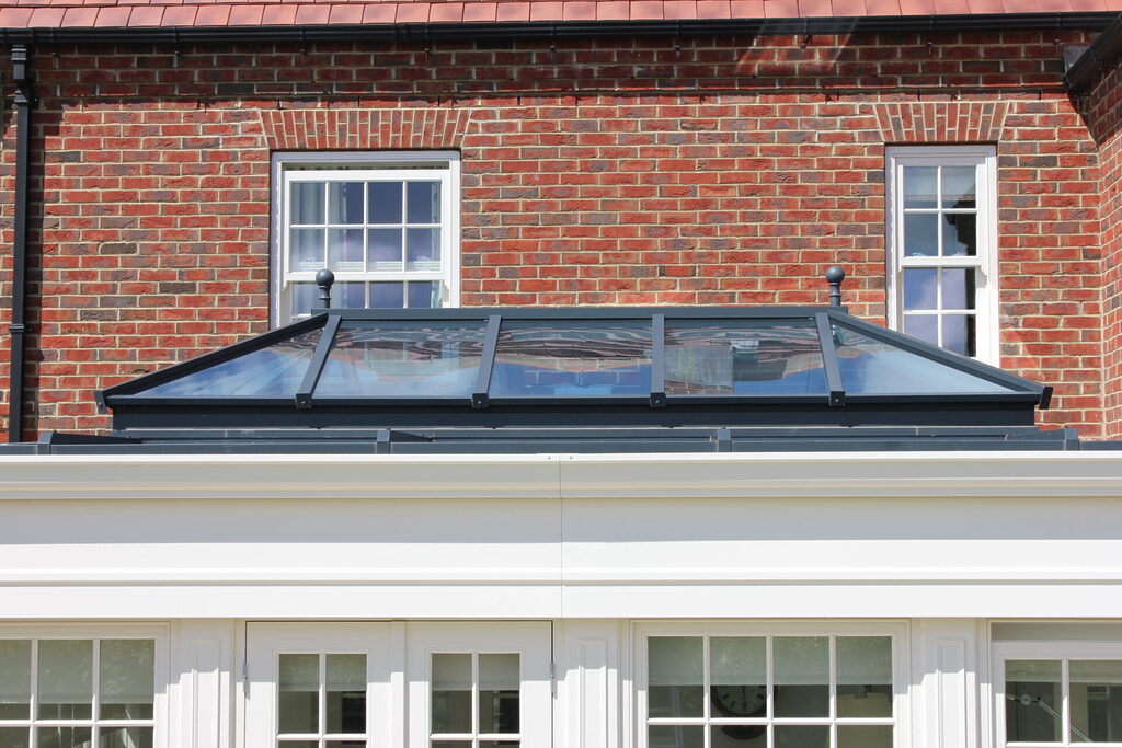 GFD Homes Roof lantern upstand detail: Side on view of an atlas roof lantern and it's upstand on an orangery