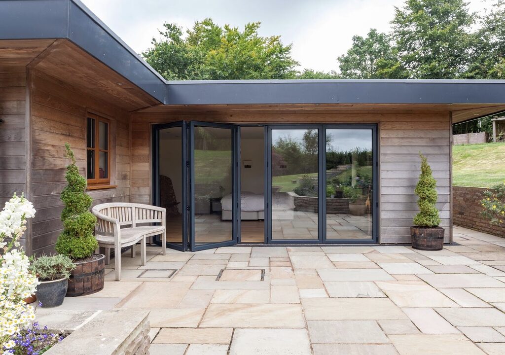 GFD Homes What is a bifold door? This,is a bifold door semi looking from the outside into a bedroom extension