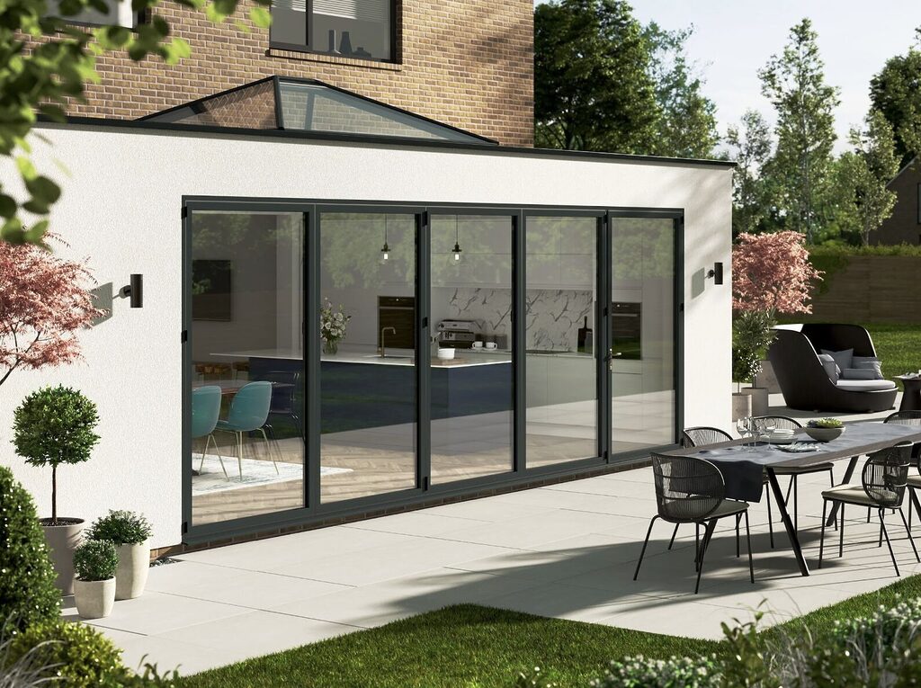 GFD Homes What is a bifold door? This is a bifold door closed looking from the outside into a kitchen extension.