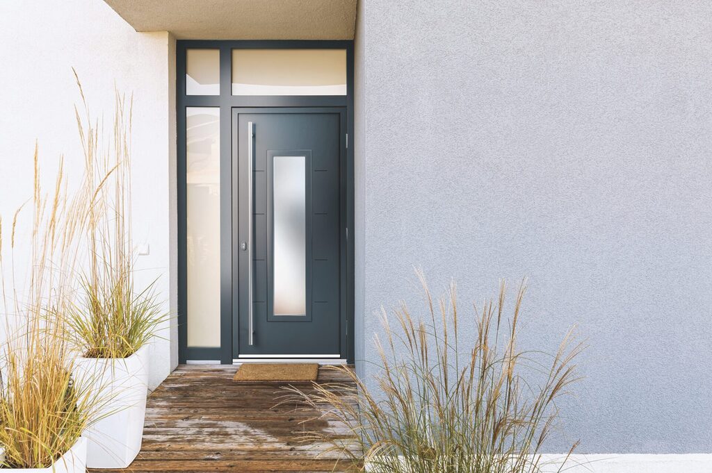 GFD Homes aluminium door with window: exterior shot of a house that has fitted an aluminum door with window side panel land topbox