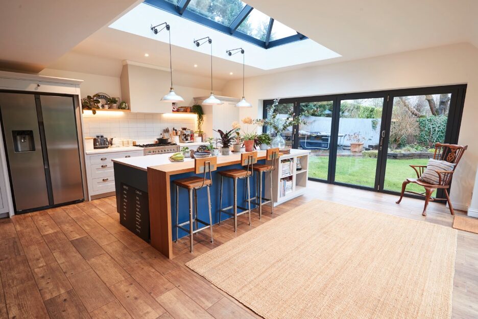 GFD Homes Roof lantern installed above kitchen area with white lights hanging from the ceiling. 