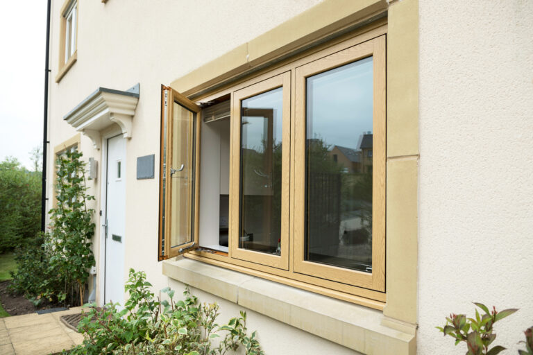 GFD Homes upvc vs aluminium windows: upvc window installed on home with side view. 