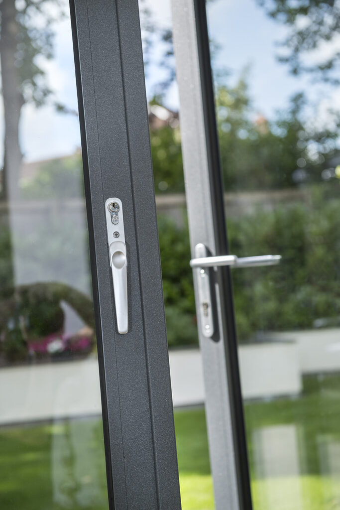 GFD Homes how to open bifold doors : bifold door handles with one part of the door slightly open 