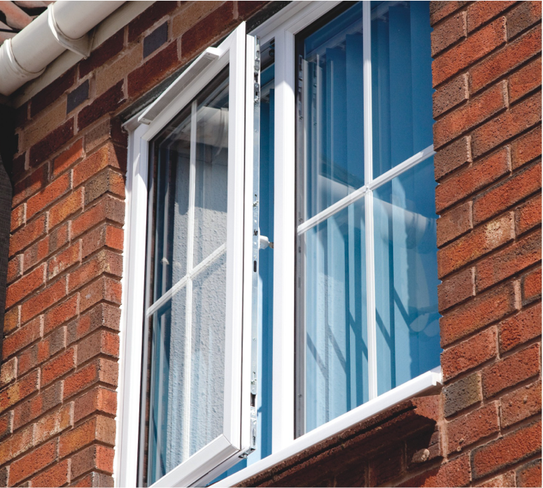 GFD Homes how to make your home more energy efficient: exterior shot of a upvc window that has been left ajar