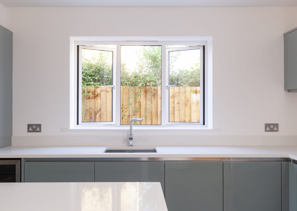 GFD Homes how to fix condensation in double glazing: interior shot of a kitchen with lovely aluminium double glazed windows