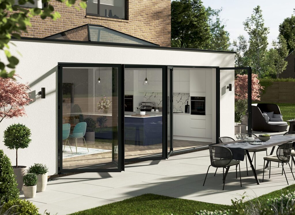 GFD Homes how to stop bifold doors blowing in the wind : exterior shot of open bifold doors 