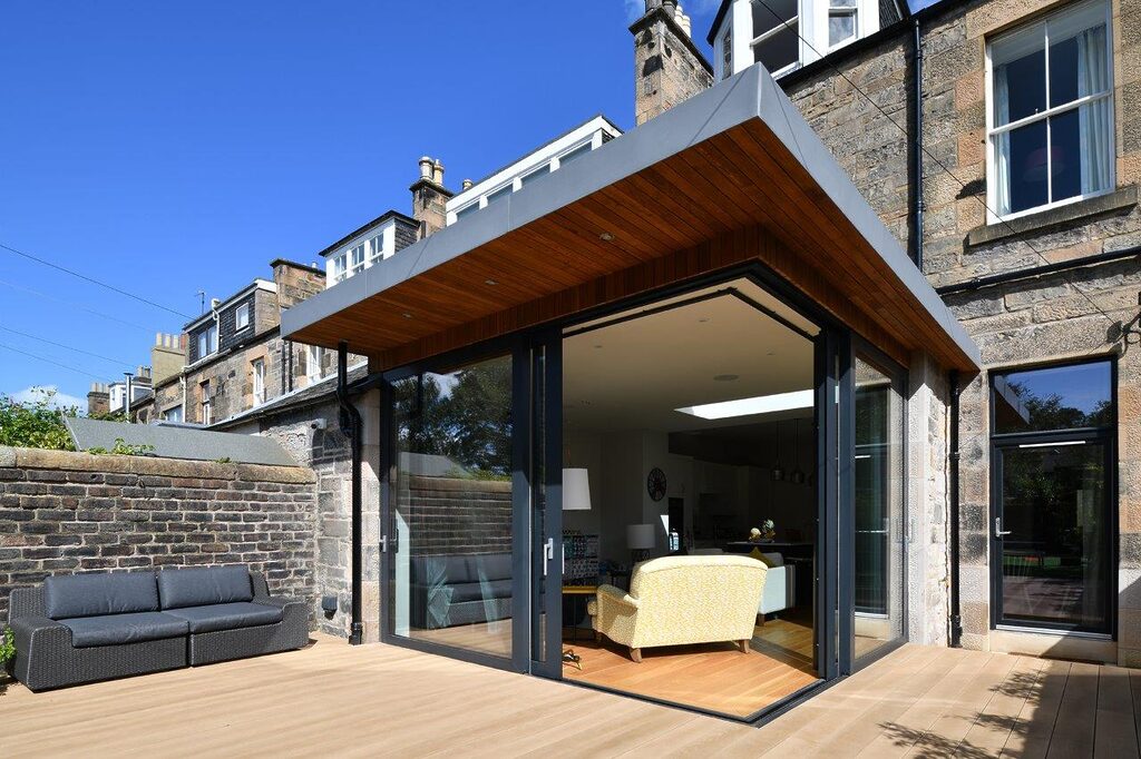 GFD Homes aluminium sliding doors near me : looking into an extension from the patio through the open sliding aluminium doors 