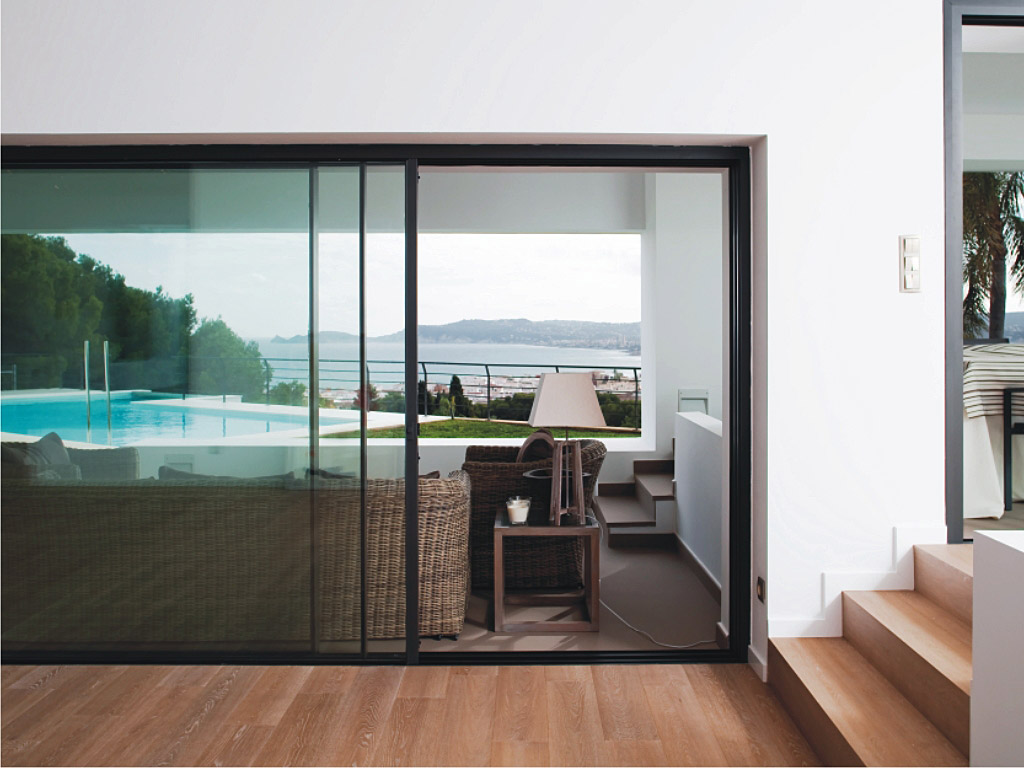 GFD Homes How to secure Patio Doors : Cortizo cor vision sliding door half opened.