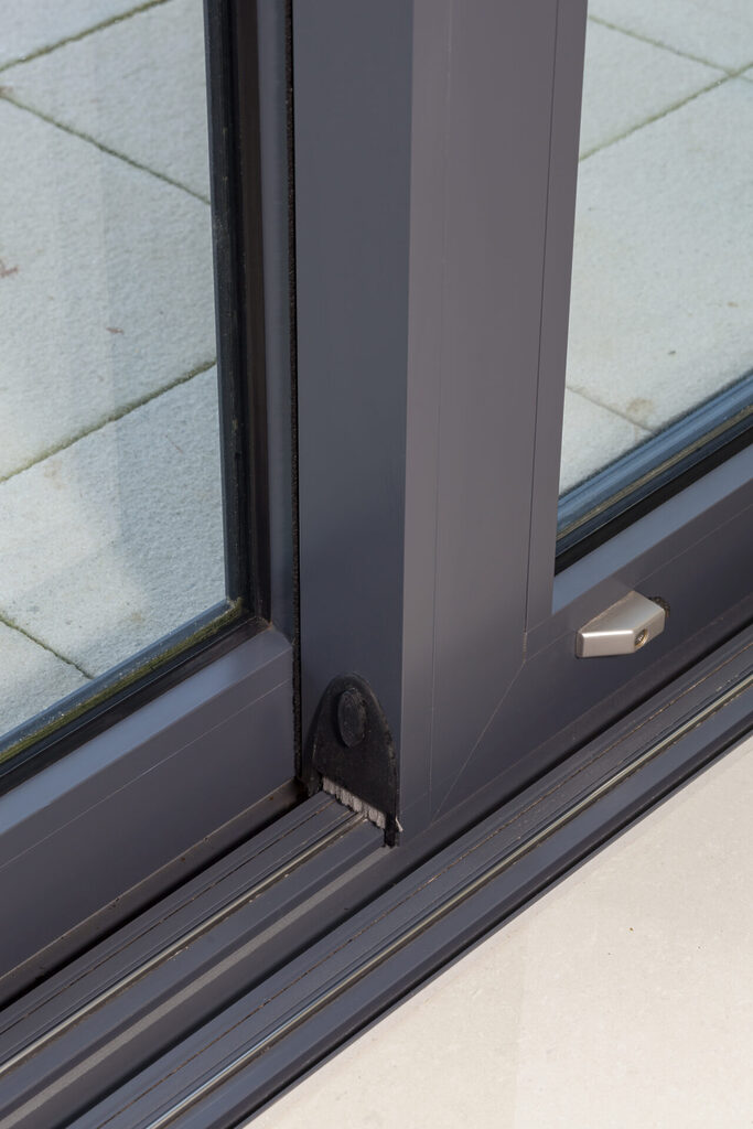 how to clean a sliding glass door : keep the tracks clean and free of debris to keep your sliding glass door functioning as intended