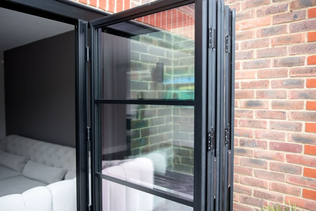 GFD Homes front doors : bifold doors folded back like an accordian. 