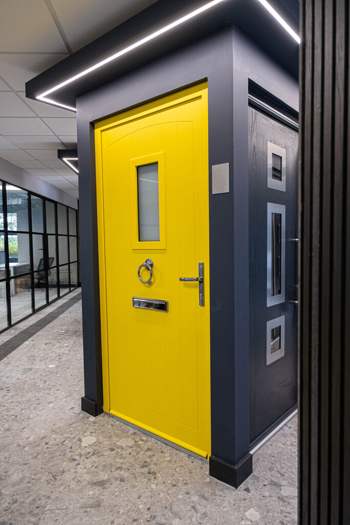 GFD Homes ce meaning : Smart Signature Broadfield door in zinc yellow, installed in GFD Homes showroom.