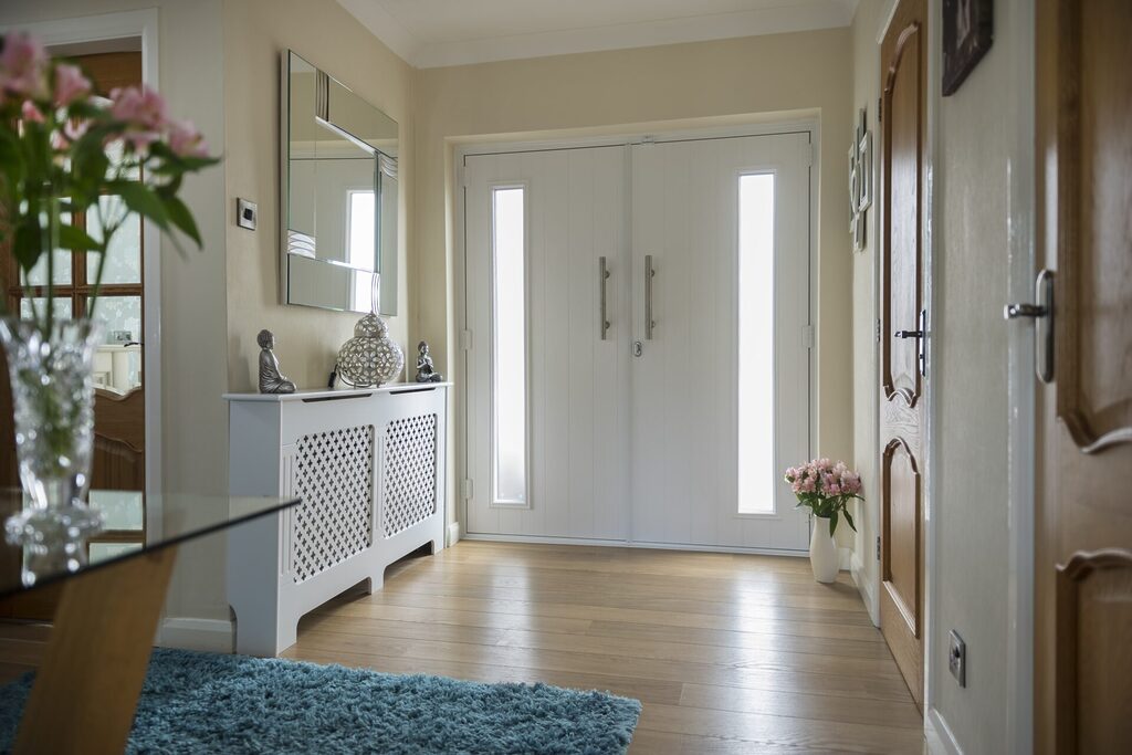 GFD Homes how to change a door handle : Solidor composite door french doors in house with internal furniture on show. 