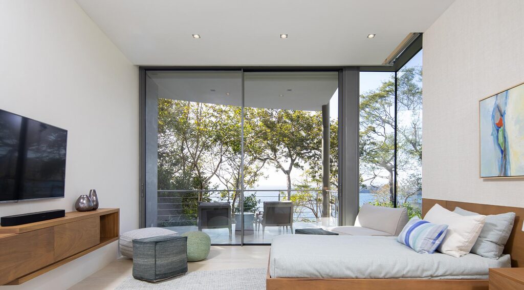 GFD Homes sliding door installation : cortizo cor vision sliding doors in a bedroom setting 