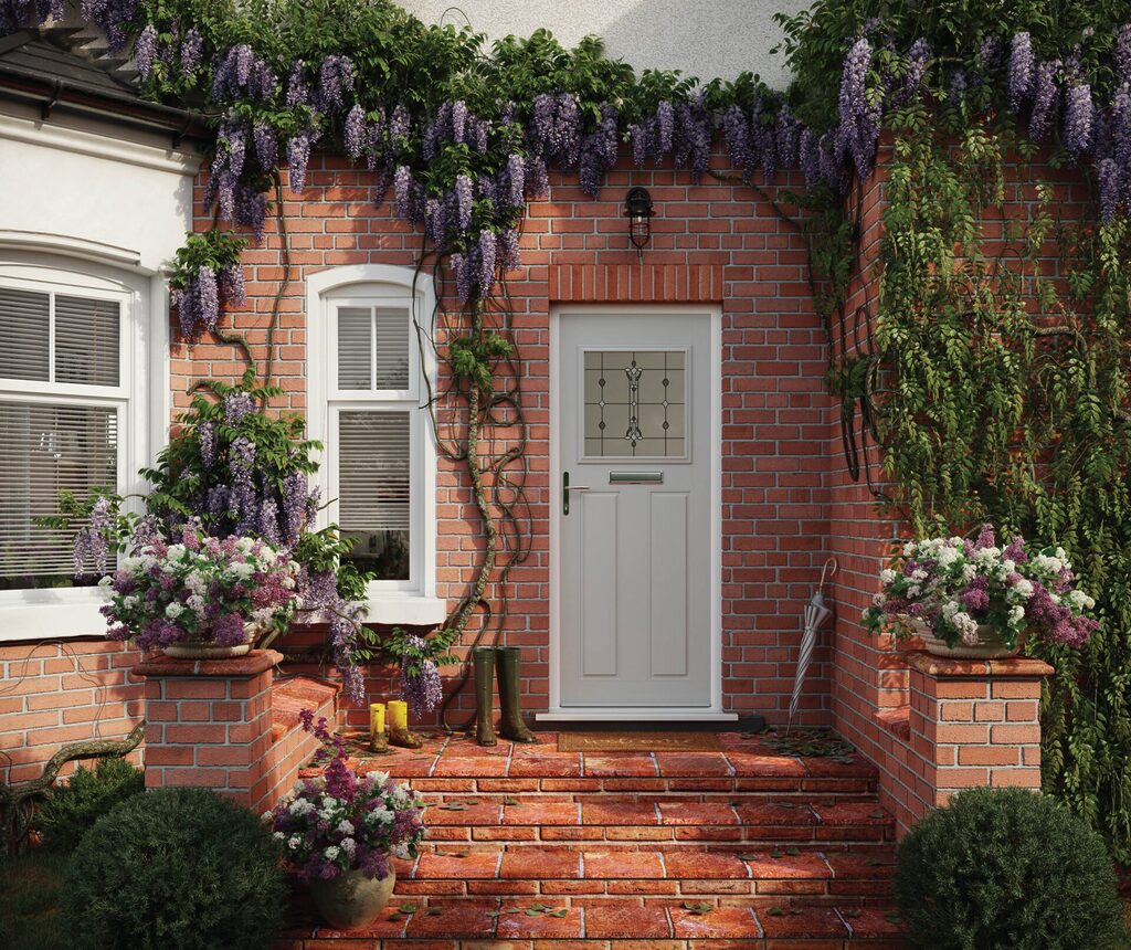 composite doors: door surrounded by flower pots and stunning brickwork