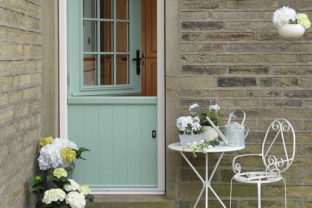 GFD Homes Stable Doors : light mint stable door against a brick wall 