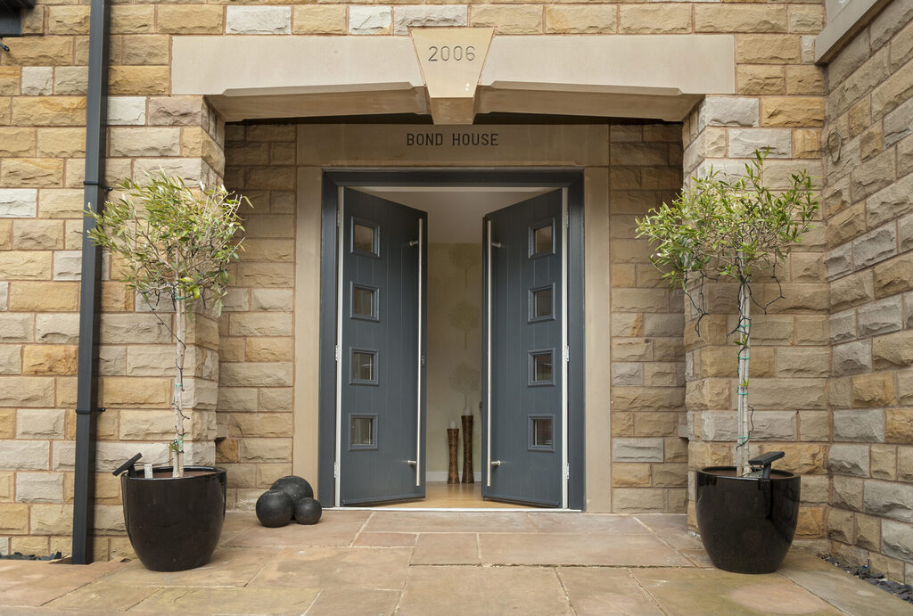 Solidor Doors : double solidor front doors in a brick entrance way 