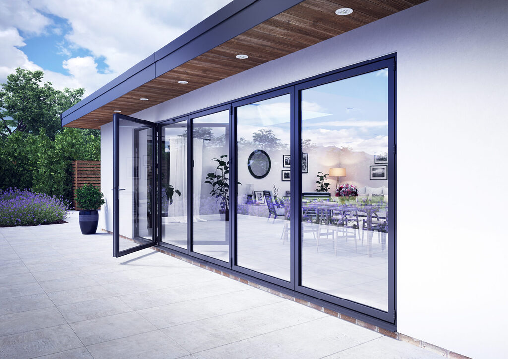 GFD Homes folding doors: bifold door side angle showing patio and kitchen inside