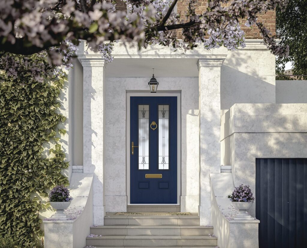 composite doors: composite door in blue with a stunning front entrance and purple flower tree.