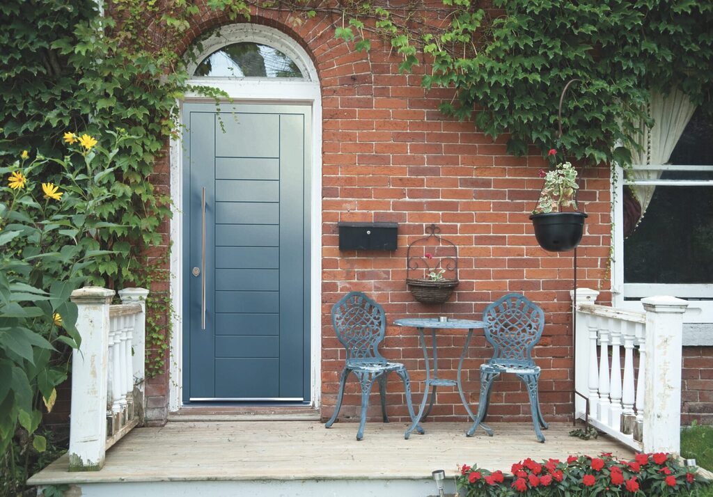 GFD Homes Door : mart designer door on a decking surrounded by foliage