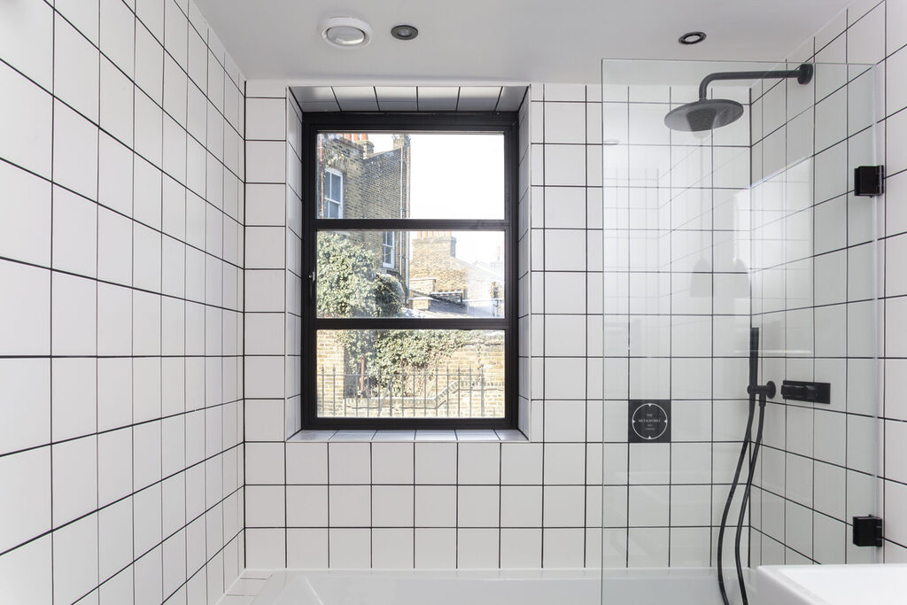 GFD Homes benefits of triple glazing: Smart heritage window installed in bathroom. 