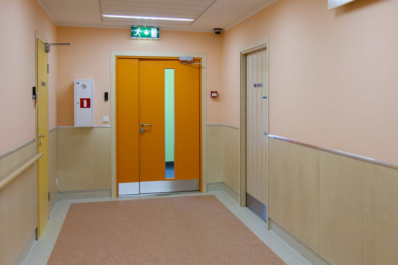 GFD Homes fire door cost : orange fire door in an office building 