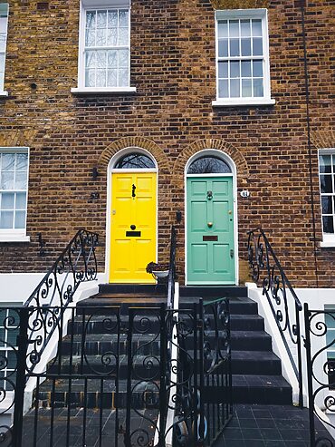 designs for front doors: photo of 2 homes side by side with different doors