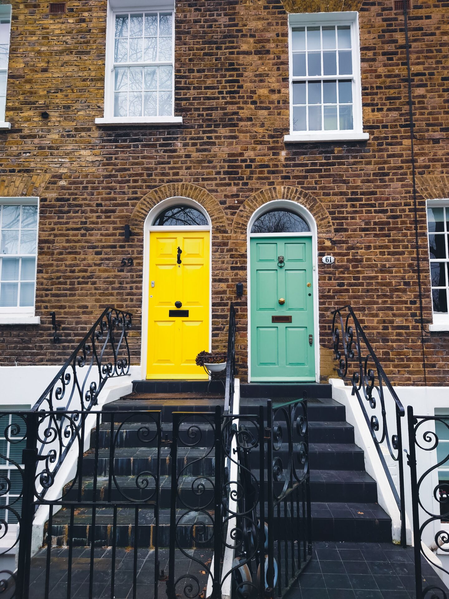 GFD Homes designs for front doors: photo of 2 homes side by side with different doors