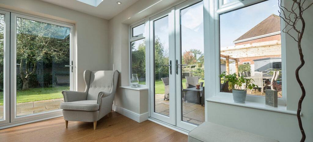 French Doors : upvc french doors in a sun room looking out to a patio