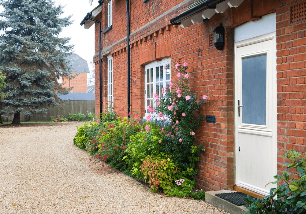 composite front doors: stable door installed on a beautiful cottage property 