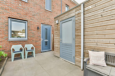 external doors: rear house view showing home and shed doors.