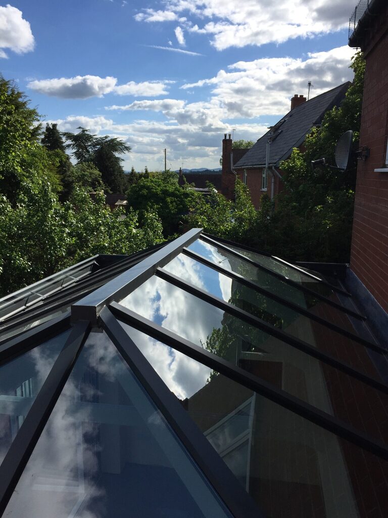 Roof lanterns : looking across an atlas roof lantern out into a garden 