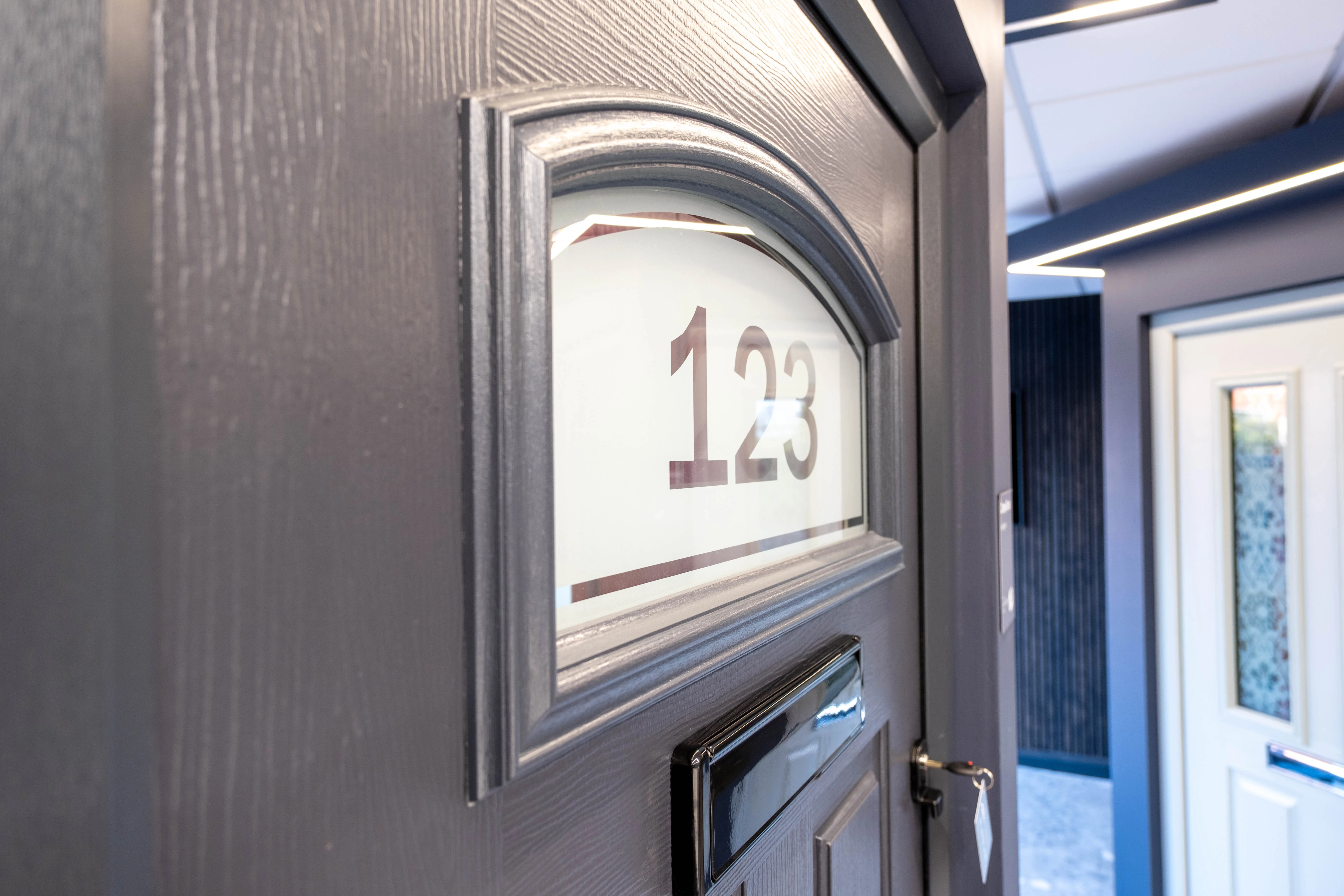 black door with letterbox 